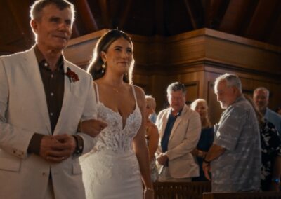 Erica & Brett walking the aisle