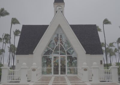 Chapel exterior with palm trees before the ceremony