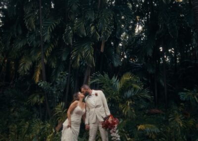 Grand Wailea wedding film frame of Erica & Brett in the tropical gardens