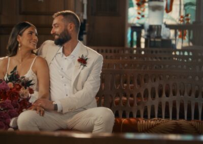 Erica & Brett seated together indoors